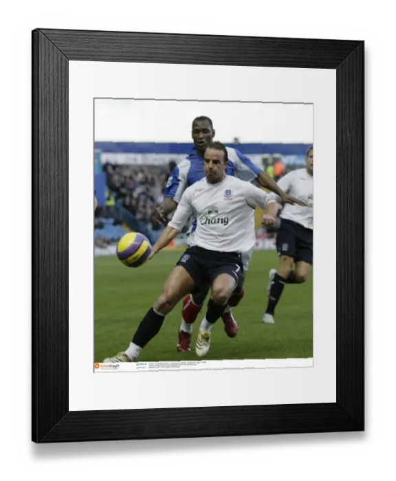 Framed Print : Portsmouth v Everton Noe Pamarot in action against Andy Van der Meyde Framed Print : Portsmouth v Everton Noe Pamarot in action against Andy Van der Meyde