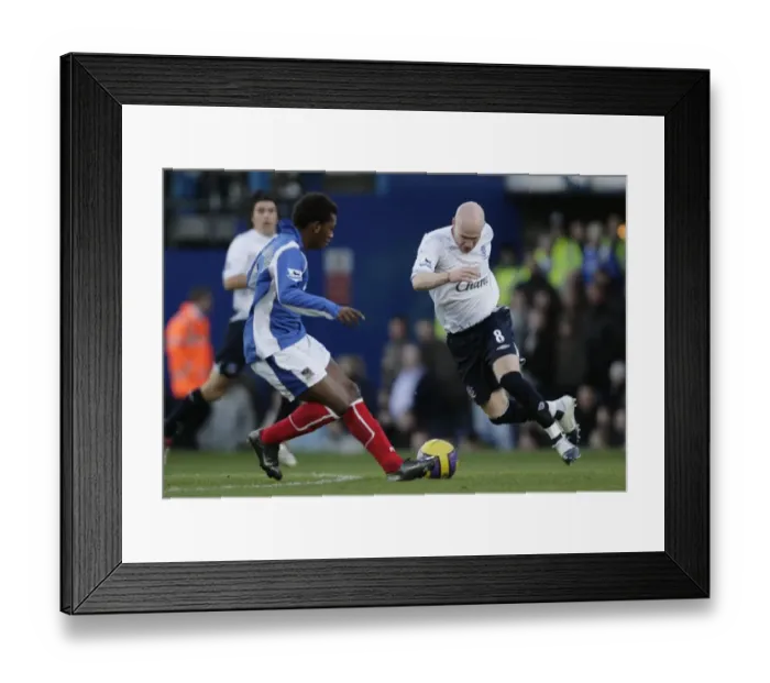 Framed Print : Portsmouth v Everton Manuel Fernandes in action against Evertons Andrew Johnson Framed Print : Portsmouth v Everton Manuel Fernandes in action against Evertons Andrew Johnson