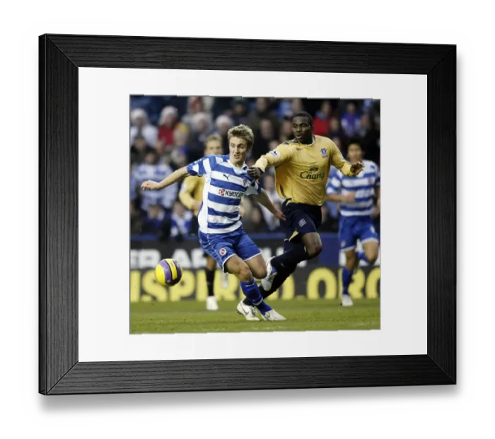 Framed Print : Reading v Everton Kevin Doyle of Reading in action with Evertons Jospeh Yobo Framed Print : Reading v Everton Kevin Doyle of Reading in action with Evertons Jospeh Yobo
