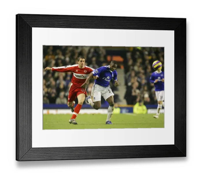 Framed Print : Everton v Middlesbrough Victor Anichebe in action with Middlesboroughs Andrew Taylor