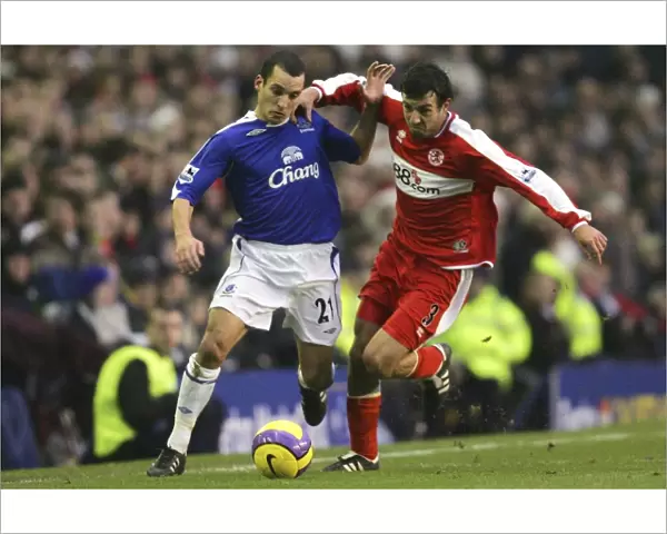 Everton v Middlesbrough Leon Osman battles with Julio Arca