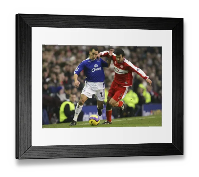 Framed Print : Everton v Middlesbrough Leon Osman battles with Julio Arca