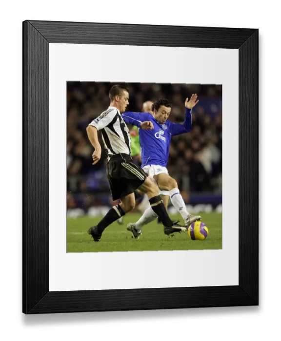 Framed Print : Everton v Newcastle United Simon Davies tackles Newcastles Scott Parker Framed Print : Everton v Newcastle United Simon Davies tackles Newcastles Scott Parker