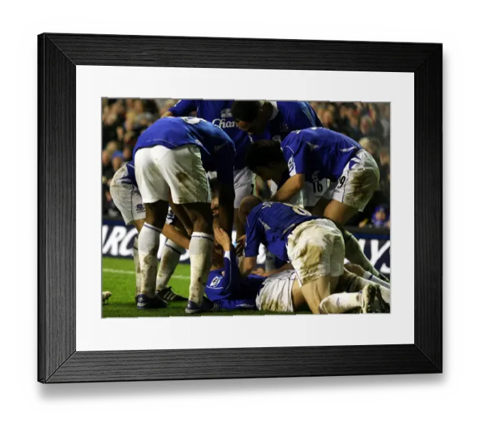 Framed Print : Phil Neville's Triumph: Everton's Third Goal Against Newcastle United Framed Print : Phil Neville's Triumph: Everton's Third Goal Against Newcastle United