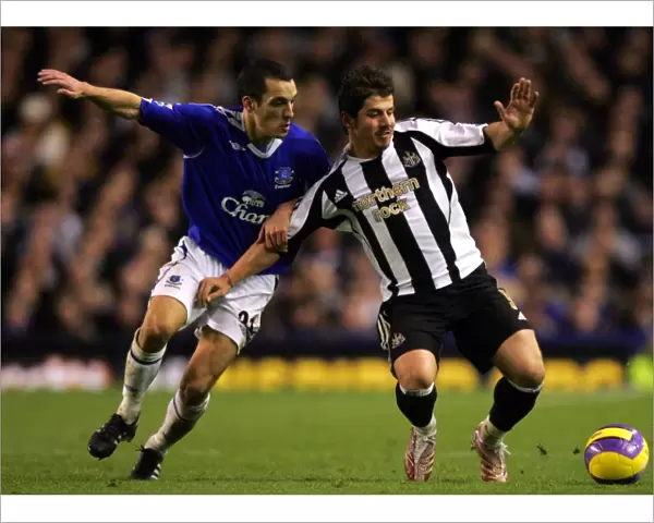 Everton v Newcastle United Leon Osman and Newcastles Emre in action