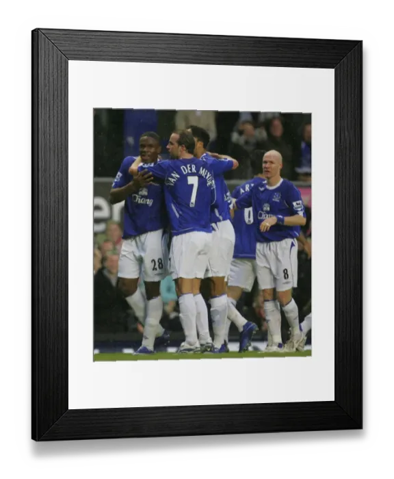 Framed Print : Everton v Newcastle United Victor Anichebe celebrates after scoring with Andy Van der Meyde Framed Print : Everton v Newcastle United Victor Anichebe celebrates after scoring with Andy Van der Meyde