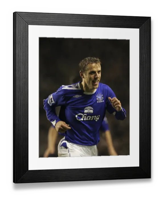 Framed Print : Everton v Newcastle United - Phil Neville celebrates after scoring Framed Print : Everton v Newcastle United - Phil Neville celebrates after scoring