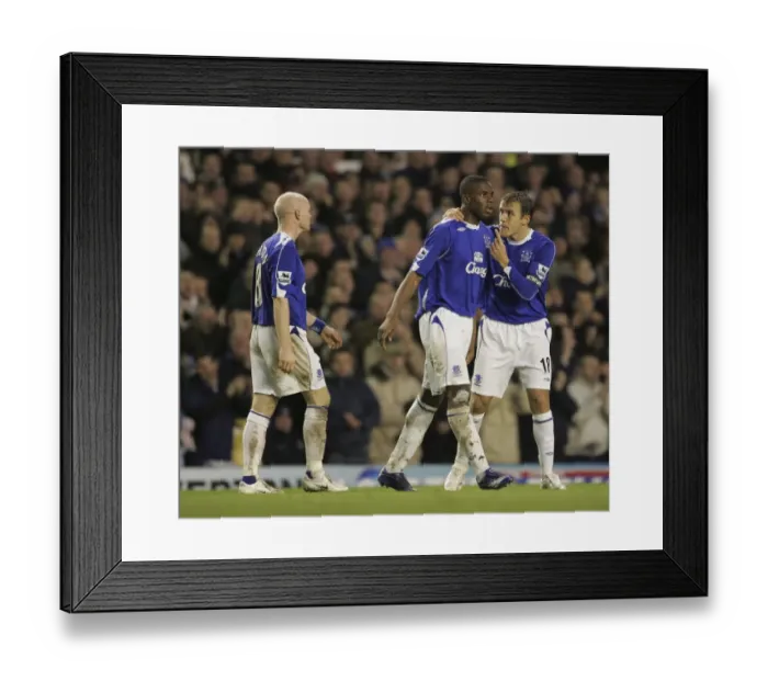 Framed Print : Everton's Victor Anichebe Scores and Celebrates Double with Captain Neville (Everton vs Newcastle United)