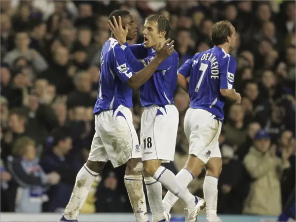 Everton v Newcastle United Victor Anichebe celebrates after scoring his second goal with captain Phil