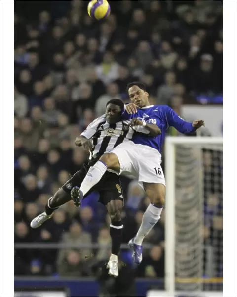 Everton FC: Lescott and Obafemi in Action Against Newcastle United