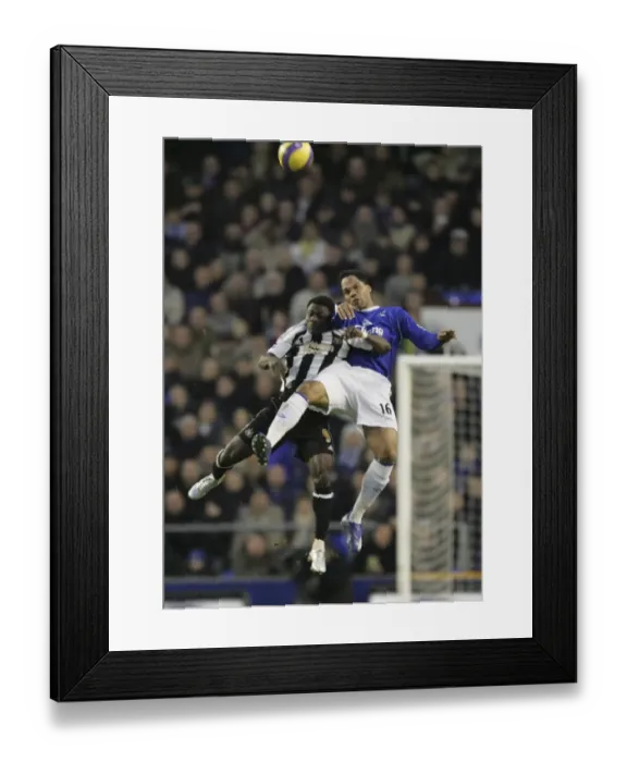 Framed Print : Everton FC: Lescott and Obafemi in Action Against Newcastle United Framed Print : Everton FC: Lescott and Obafemi in Action Against Newcastle United
