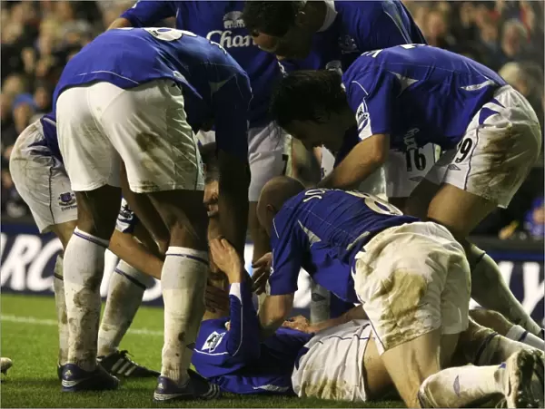 Everton's Phil Neville: Celebrating a Goal with Team Mates vs Newcastle United