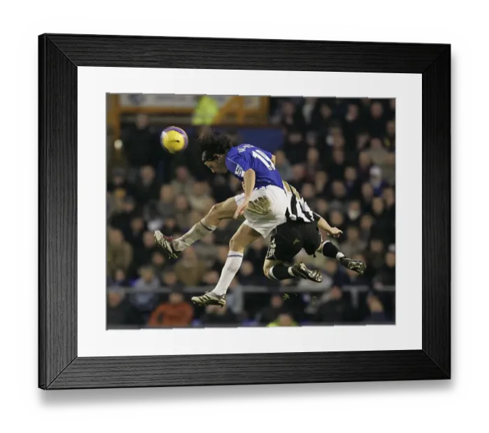 Framed Print : Nuno Valente Outmuscles James Milner: A Headed Battle at Everton vs. Newcastle United Framed Print : Nuno Valente Outmuscles James Milner: A Headed Battle at Everton vs. Newcastle United