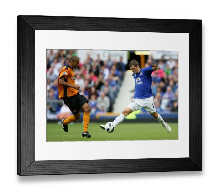 Framed Print : Clash at Goodison Park: Diniyar Bilyaletdinov vs. Karl Henry (Everton vs. Wolverhampton Wanderers, Barclays Premier League, 21 August 2010) Framed Print : Clash at Goodison Park: Diniyar Bilyaletdinov vs. Karl Henry (Everton vs. Wolverhampton Wanderers, Barclays Premier League, 21 August 2010)