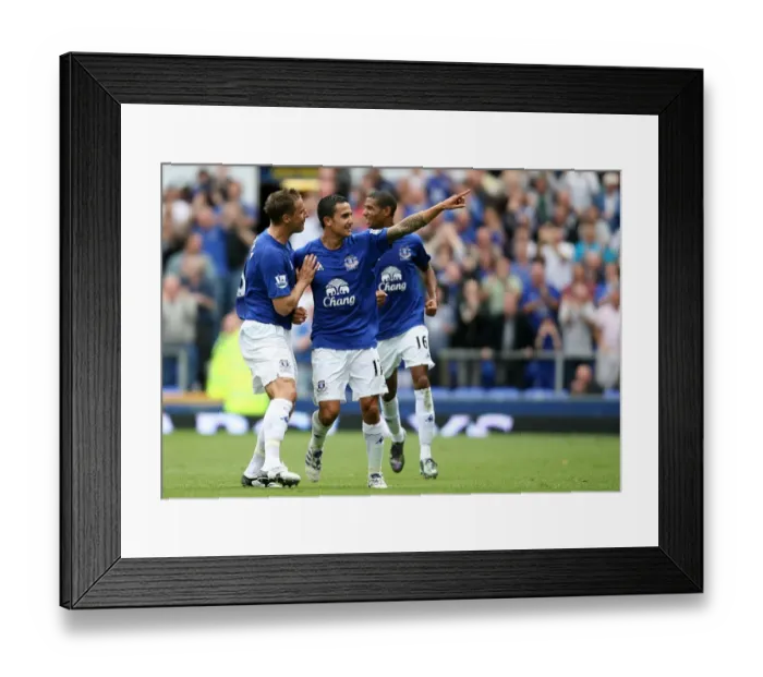 Framed Print : Tim Cahill's Thunderbolt: Everton's Historic First Goal in Premier League Debut Against Wolverhampton Wanderers Framed Print : Tim Cahill's Thunderbolt: Everton's Historic First Goal in Premier League Debut Against Wolverhampton Wanderers