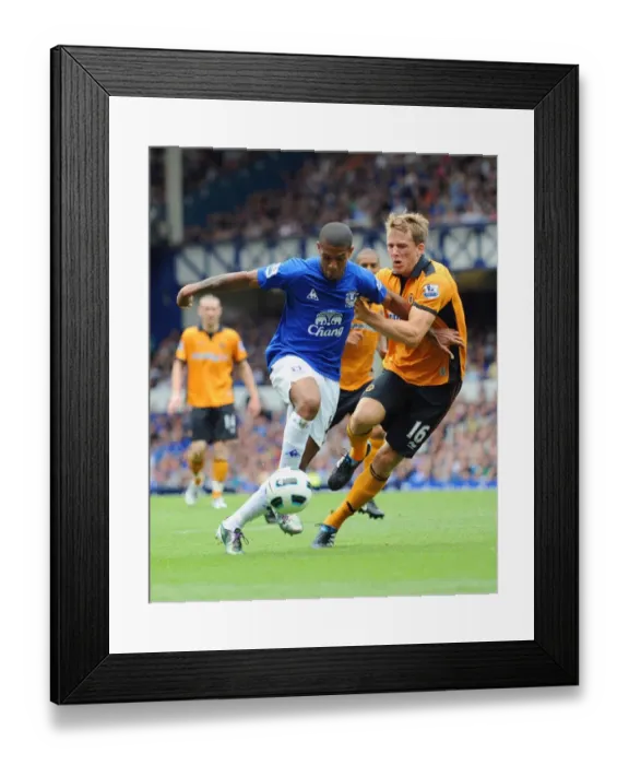 Framed Print : Jermaine Beckford vs. Christophe Berra: A Battle for the Goal (Everton vs. Wolverhampton Wanderers, Barclays Premier League, Goodison Park, 2010)