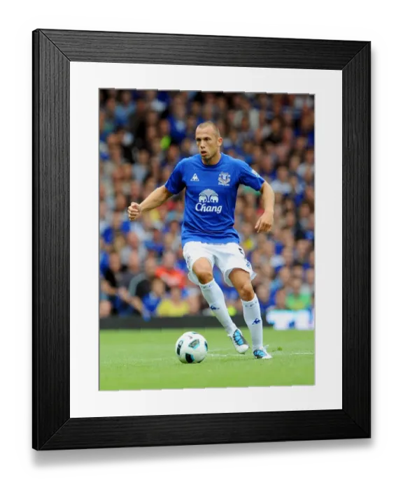 Framed Print : John Heitinga's Thrilling Performance: Everton vs. Wolverhampton Wanderers, Barclays Premier League (August 2010)