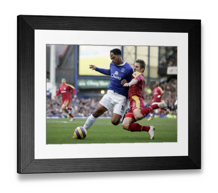 Framed Print : Lescott vs Doyle: A Battle at Goodison Park - Everton vs Reading, FA Barclays Premiership, 14 / 01 / 07 Framed Print : Lescott vs Doyle: A Battle at Goodison Park - Everton vs Reading, FA Barclays Premiership, 14 / 01 / 07