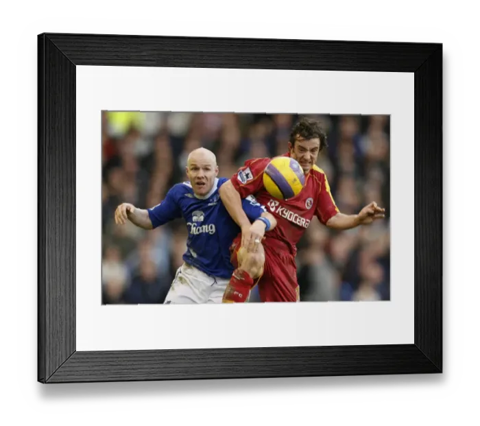 Framed Print : Evertons Johnson challenges Readings Hunt for the ball during their English Premier League soccer Framed Print : Evertons Johnson challenges Readings Hunt for the ball during their English Premier League soccer