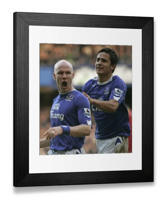 Framed Print : Everton's Unforgettable Moment: Johnson and Cahill's Thrilling Goal Celebration
