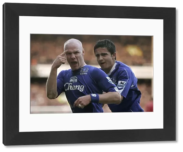 Evertons Johnson celebrates with Cahill after scoring during their English Premier League soccer ma