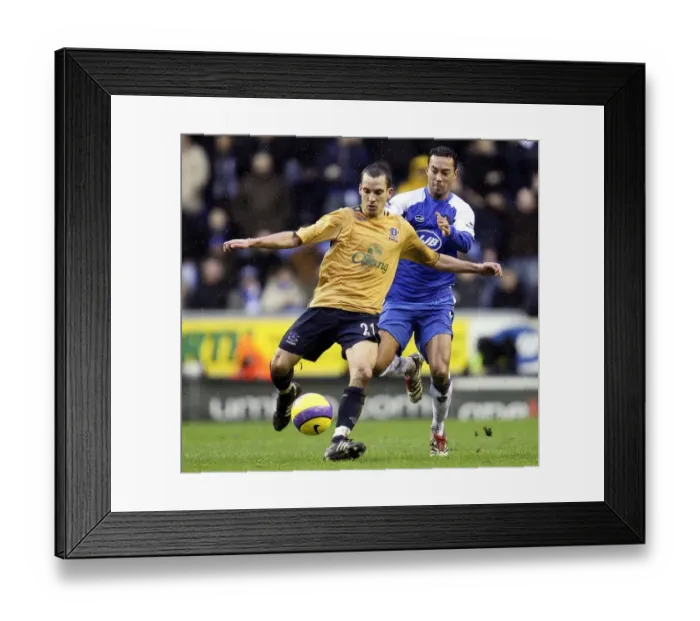 Framed Print : Denny Landzaat vs. Leon Osman: A Football Rivalry at Wigan Athletic's JJB Stadium (Everton vs. Wigan, FA Barclays Premiership, 21st January 2007) Framed Print : Denny Landzaat vs. Leon Osman: A Football Rivalry at Wigan Athletic's JJB Stadium (Everton vs. Wigan, FA Barclays Premiership, 21st January 2007)