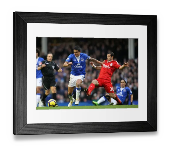 Framed Print : Tim Cahill vs Javier Mascherano: The Epic Battle at Goodison Park - Premier League Soccer Rivalry Framed Print : Tim Cahill vs Javier Mascherano: The Epic Battle at Goodison Park - Premier League Soccer Rivalry