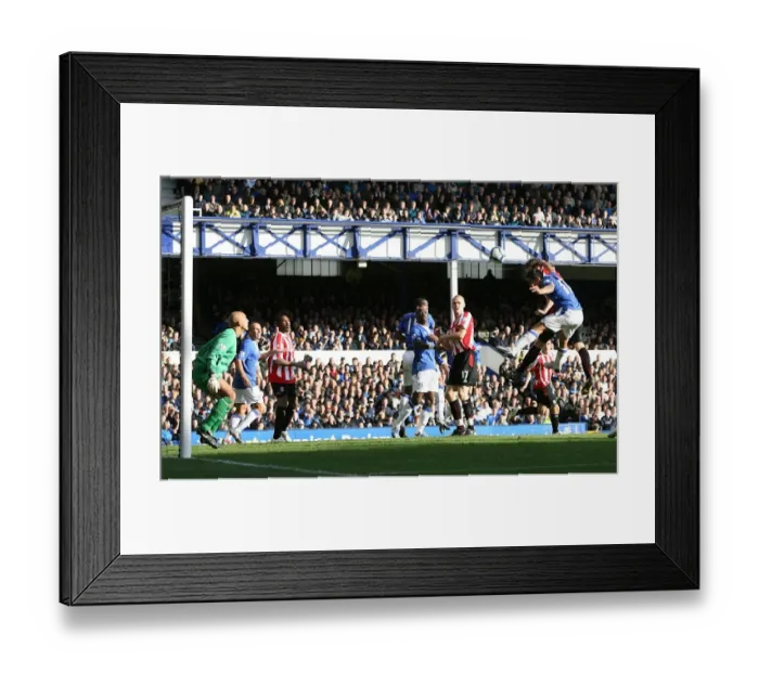 Framed Print : Robert Huth Scores the Opener: Everton vs Stoke City - Barclays Premier League Soccer Framed Print : Robert Huth Scores the Opener: Everton vs Stoke City - Barclays Premier League Soccer
