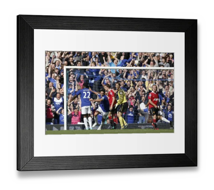 Framed Print : Mikel Arteta's Triumph: Everton's Thrilling Third Goal Against Manchester United at Goodison Park