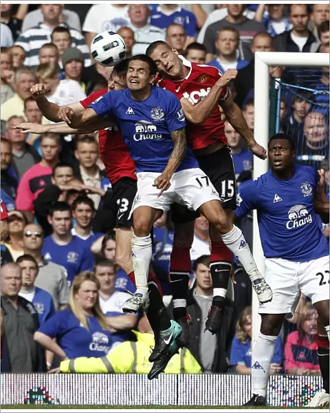 Determined Tim Cahill: Everton's Battle Against Manchester United in the Premier League at Goodison Park