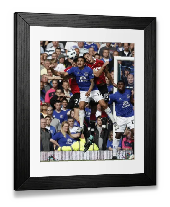 Framed Print : Determined Tim Cahill: Everton's Battle Against Manchester United in the Premier League at Goodison Park Framed Print : Determined Tim Cahill: Everton's Battle Against Manchester United in the Premier League at Goodison Park