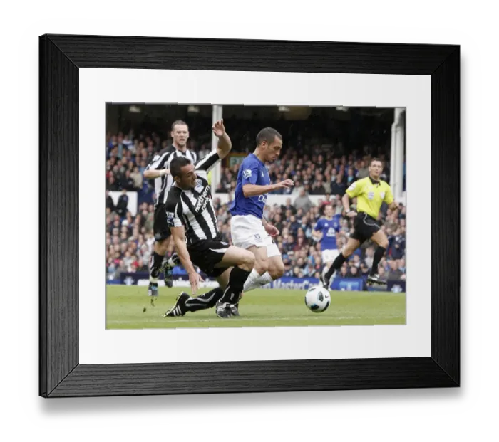 Framed Print : Everton vs Newcastle United: A Clash at Goodison Park - Osman vs Enrique Framed Print : Everton vs Newcastle United: A Clash at Goodison Park - Osman vs Enrique