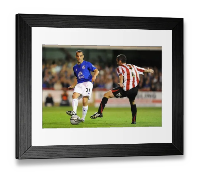 Framed Print : Intense Battle: Osman vs O'Connor at Griffin Park - Everton vs Brentford, Carling Cup Third Round Framed Print : Intense Battle: Osman vs O'Connor at Griffin Park - Everton vs Brentford, Carling Cup Third Round