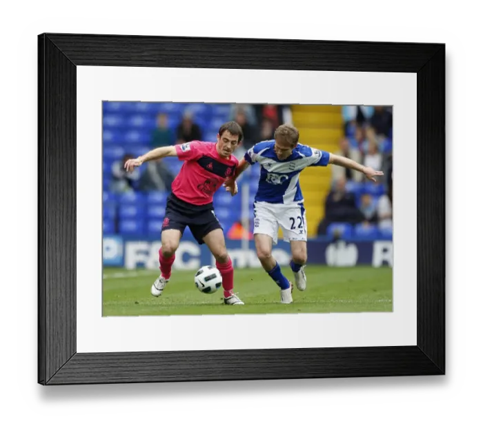 Framed Print : Intense Rivalry: Baines vs. Hleb Battle for Ball at St. Andrews, October 2010 Framed Print : Intense Rivalry: Baines vs. Hleb Battle for Ball at St. Andrews, October 2010