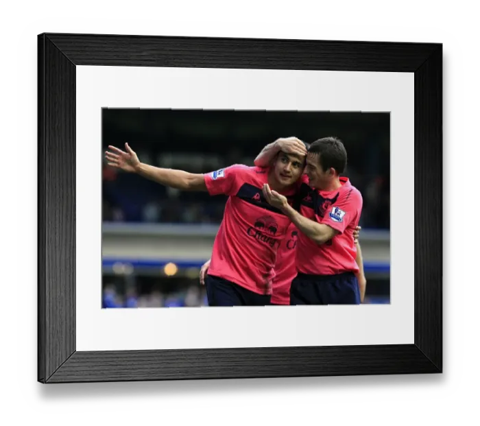 Framed Print : Everton's Unforgettable Moment: Tim Cahill and Leighton Baines Celebrate the Toffees Second Goal vs. Birmingham City Framed Print : Everton's Unforgettable Moment: Tim Cahill and Leighton Baines Celebrate the Toffees Second Goal vs. Birmingham City