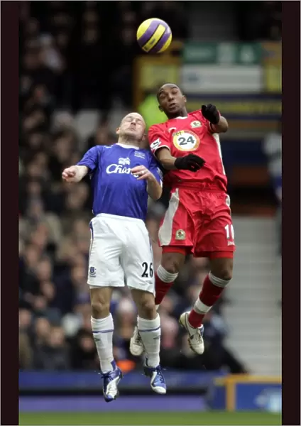 Everton v Blackburn Rovers Benni McCarthy and Lee Carsley in action