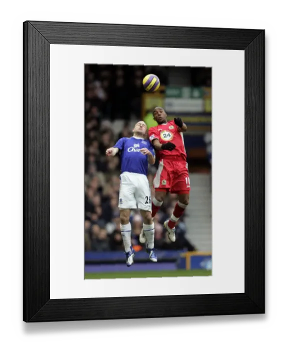 Framed Print : Everton v Blackburn Rovers Benni McCarthy and Lee Carsley in action Framed Print : Everton v Blackburn Rovers Benni McCarthy and Lee Carsley in action