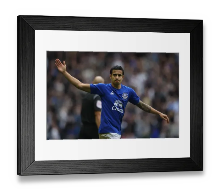 Framed Print : Tim Cahill's Thrilling Goal: Everton vs. Liverpool at Goodison Park - Barclays Premier League: A Legendary Moment Framed Print : Tim Cahill's Thrilling Goal: Everton vs. Liverpool at Goodison Park - Barclays Premier League: A Legendary Moment