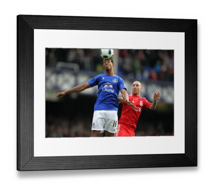 Framed Print : Determined Clash: Jermaine Beckford vs. Raul Meireles at Goodison Park - Everton vs. Liverpool (Barclays Premier League, 17 October 2010) Framed Print : Determined Clash: Jermaine Beckford vs. Raul Meireles at Goodison Park - Everton vs. Liverpool (Barclays Premier League, 17 October 2010)