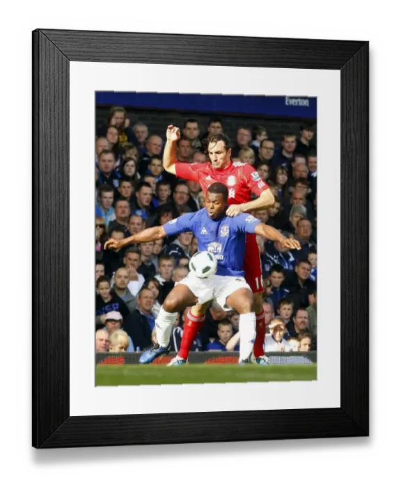 Framed Print : Yakubu Shields Off Kyrgiakos: Everton vs Liverpool, Barclays Premier League, Goodison Park (17 October 2010)