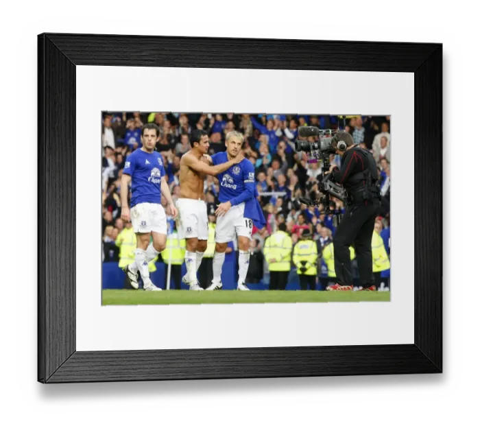 Framed Print : Everton's Glory: Tim Cahill and Phil Neville's Derby Victory Celebration at Goodison Park Framed Print : Everton's Glory: Tim Cahill and Phil Neville's Derby Victory Celebration at Goodison Park