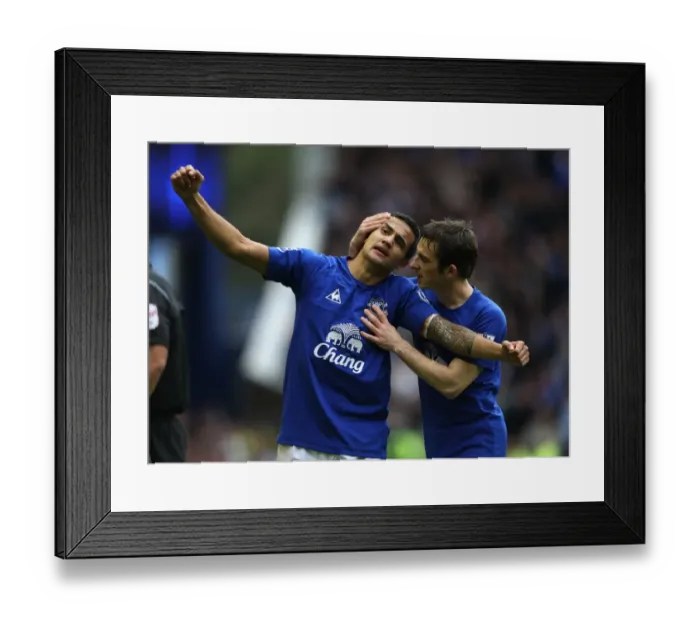 Framed Print : Everton's Tim Cahill and Leighton Baines: Unforgettable Goal Celebration Against Liverpool at Goodison Park Framed Print : Everton's Tim Cahill and Leighton Baines: Unforgettable Goal Celebration Against Liverpool at Goodison Park