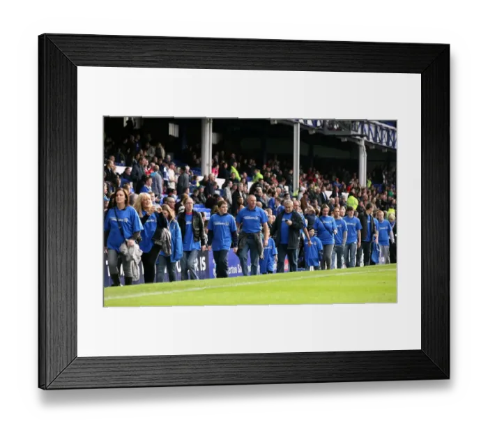 Framed Print : Community Unity at Goodison Park: Everton FC Volunteers and Staff Gather at Half-Time vs Stoke City (30 October 2010) Framed Print : Community Unity at Goodison Park: Everton FC Volunteers and Staff Gather at Half-Time vs Stoke City (30 October 2010)