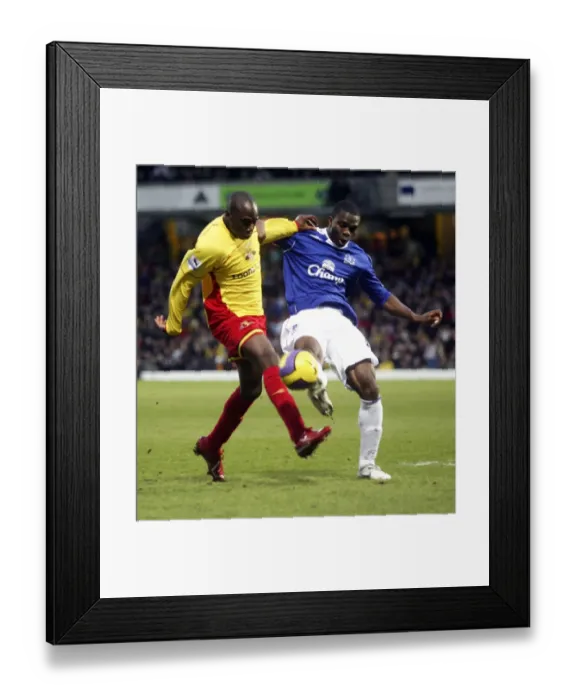 Framed Print : Watford v Everton Steve Kabba of Watford in action with Evertons Joseph Yobo