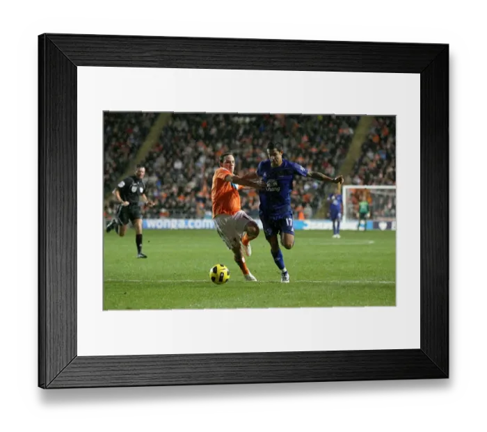 Framed Print : Tim Cahill vs. David Vaughan: A Battle at Everton vs. Blackpool, Premier League Framed Print : Tim Cahill vs. David Vaughan: A Battle at Everton vs. Blackpool, Premier League