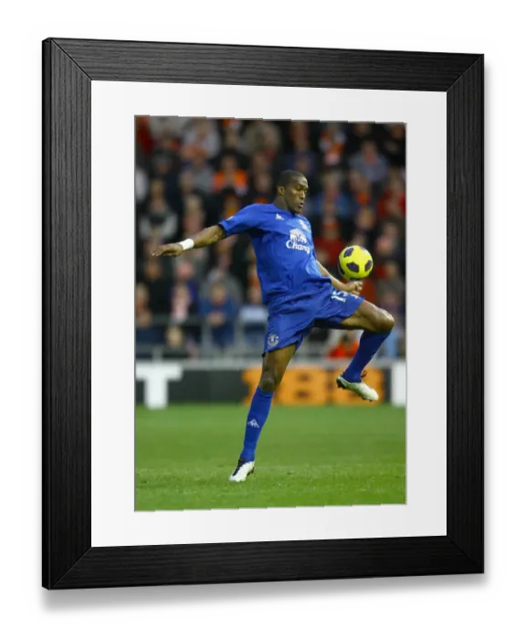 Framed Print : Sylvain Distin Faces Off in Everton's Barclays Premier League Clash Against Blackpool (November 6, 2010)