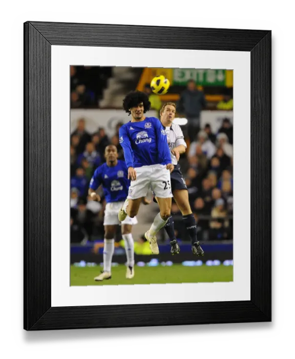 Framed Print : Head-to-Head at Goodison Park: A Battle of Aerial Supremacy between Fellaini and Davies (Everton vs. Bolton Wanderers, Barclays Premier League, 10 November 2010) Framed Print : Head-to-Head at Goodison Park: A Battle of Aerial Supremacy between Fellaini and Davies (Everton vs. Bolton Wanderers, Barclays Premier League, 10 November 2010)