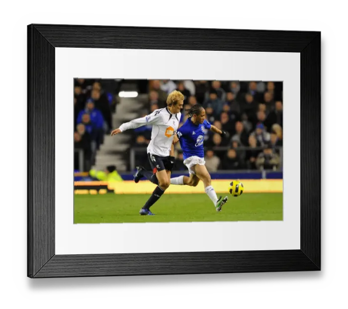 Framed Print : Intense Rivalry on the Field: Pienaar vs. Holden - Everton vs. Bolton Wanderers: Battle for the Ball Framed Print : Intense Rivalry on the Field: Pienaar vs. Holden - Everton vs. Bolton Wanderers: Battle for the Ball