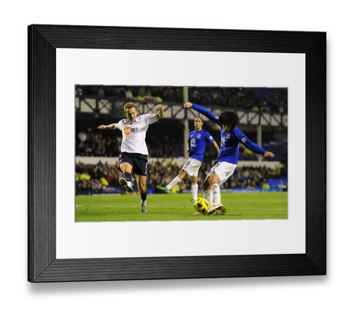 Framed Print : Determined Duel: Fellaini's Brave Shot Against Bolton Wanderers in Everton's Premier League Clash (10 November 2010) Framed Print : Determined Duel: Fellaini's Brave Shot Against Bolton Wanderers in Everton's Premier League Clash (10 November 2010)