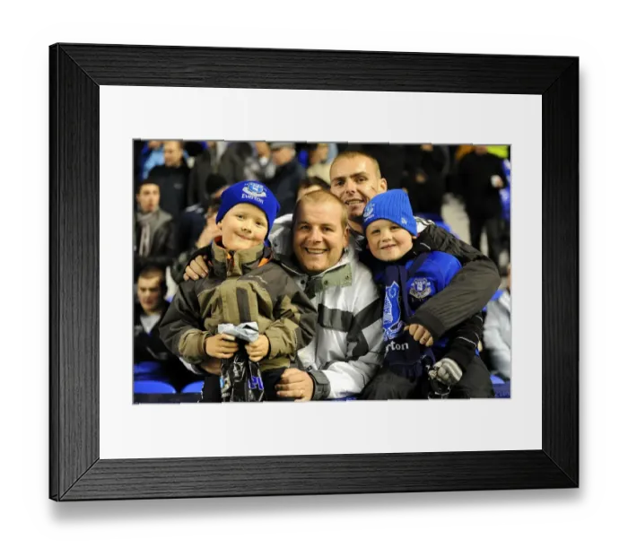 Framed Print : A Sea of Passion: Everton FC Fans Unite at Goodison Park during the Everton vs. Bolton Wanderers Premier League Match (10 November 2010)